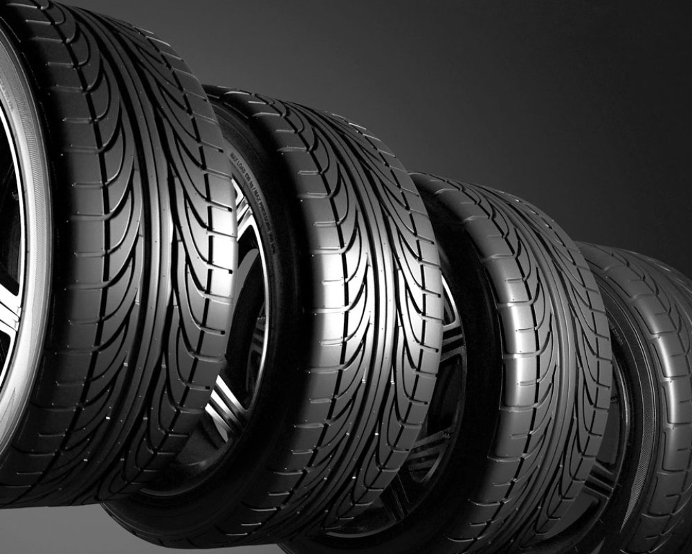 3d-illustration-four-car-wheels-on-black-backgrou-2021-09-04-09-31-00-utc-3.jpg